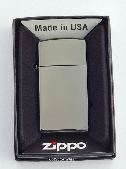Zippo Ebony Slim Line 60001260 mit spiegelnder Hochglanzoberfläche in geöffneter Originalverpackung