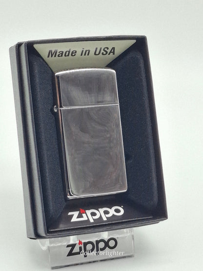 Zippo Chrome Hochglanz Slim Line 60001174 mit spiegelnder Chromoberfläche in geöffneter Originalverpackung