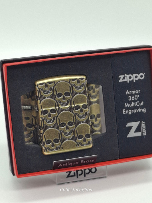 Zippo Benzinfeuerzeug Zippo - Skulls Design Multi Cut Antique Brass Armor Case 60007234 60007234 Zippo - Skulls Design Multi Cut Antique Brass Armor Case 60007234